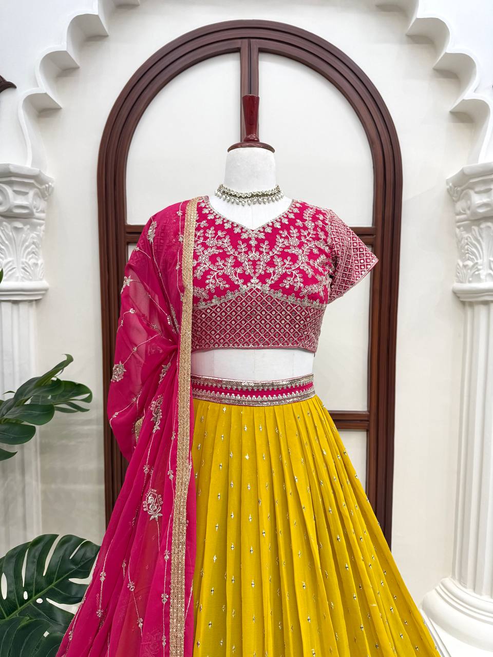 Vibrant Sunshine Yellow and Fuchsia Pink Designer Lehenga Choli with Dazzling Shimmer Embellishments